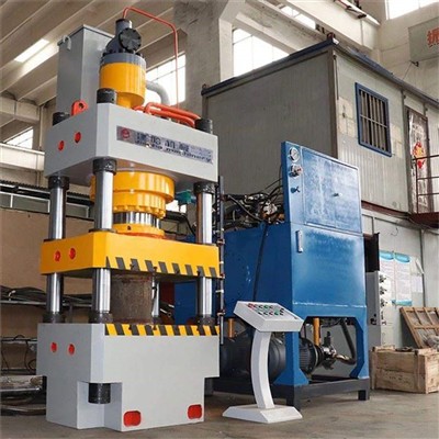 What are the precautions for the four-column hydraulic press during the pressure test?